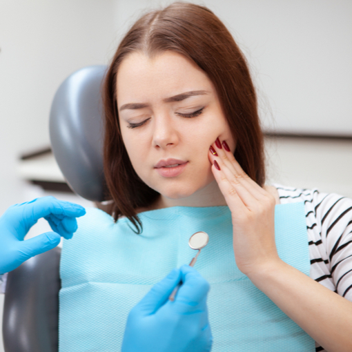 female patient experiencing a dental emergency in Ottawa