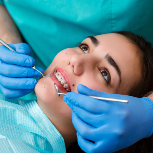 shutterstock_776997145 dental hygienist preparing a patient for a dental implant procedure