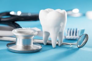a tooth and various tools