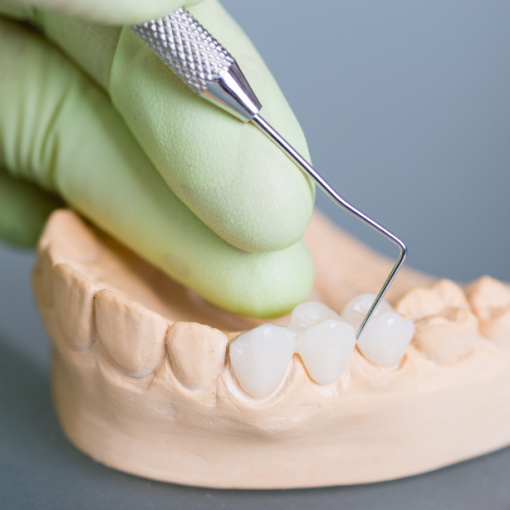 Shutterstock_251585086 Woman calling Sekhon Dental from her family room for emergency dental appointment