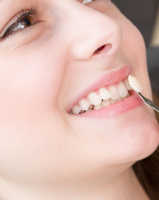 Shutterstock_288829217 dental hygienist preparing a patient for a dental implant procedure