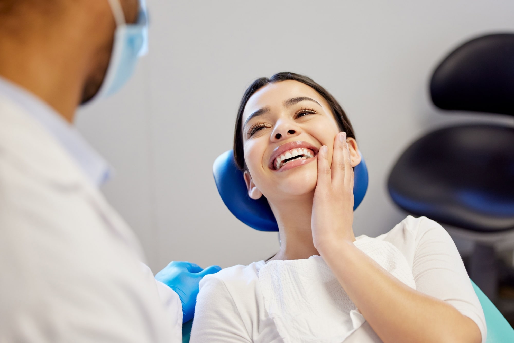woman smiling after a cosmetic dentistry procedure