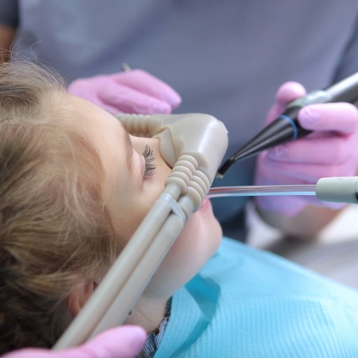 dental sedation in kids a child patient during dental sedation